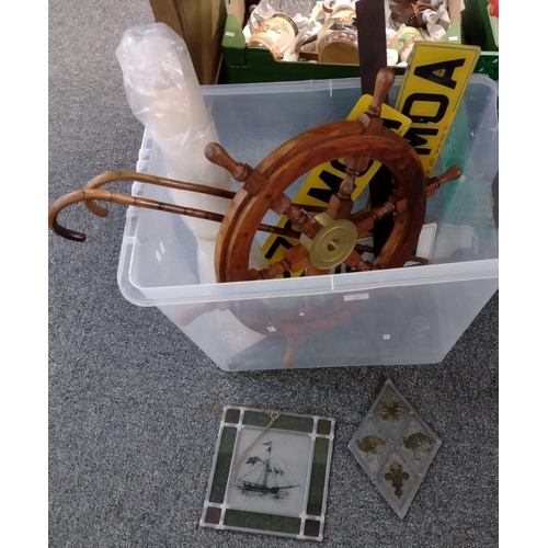 389 - Large plastic box containing; ship's wheel, walking canes, old prints, stained glass, vintage engine... 