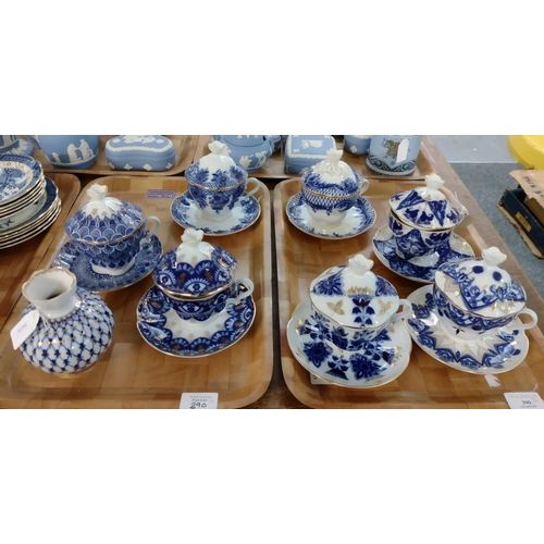 390 - Two trays of Russian Lomonosov porcelain from St Petersburg to include: seven covered teacups and sa... 