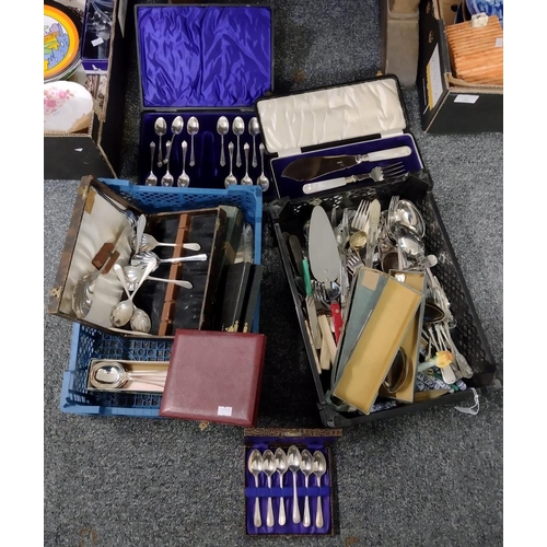 397 - Two boxes of assorted cutlery: loose silver plate, Rheingold knives with china handles, cased sets e... 