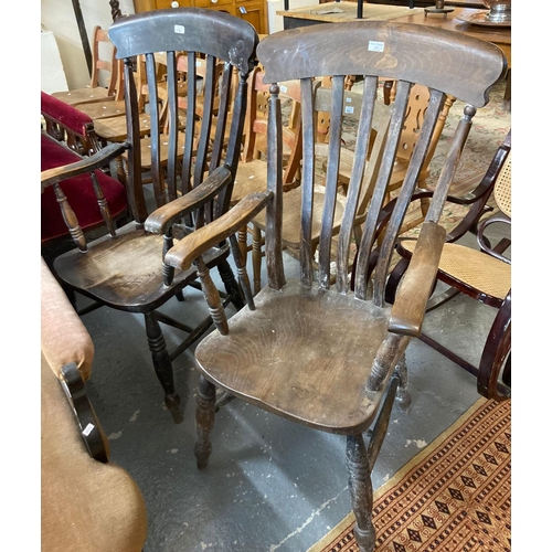 538 - Two similar late 19th early 20th century stained slat back farmhouse kitchen armchairs.  (2)  (B.P. ... 