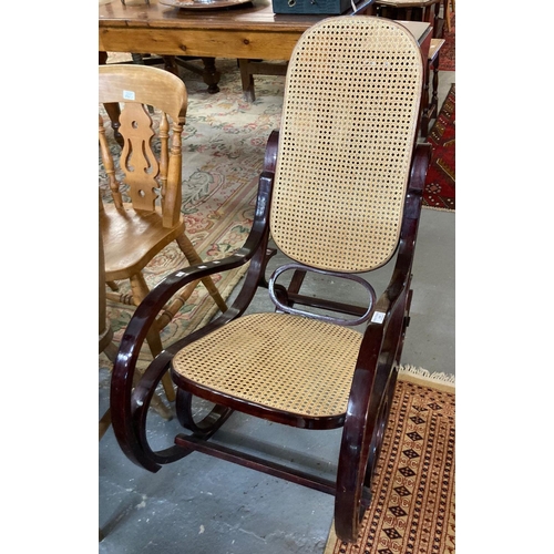 539 - Modern stained bentwood and cane rocking armchair.  (B.P. 21% + VAT)