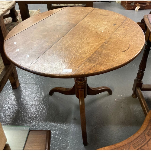 568 - 19th century oak snap top tripod table.  (B.P. 21% + VAT)