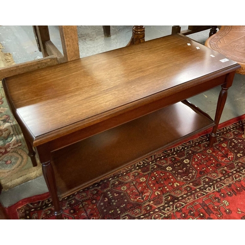 569 - Reproduction mahogany rectangular coffee table with under tier.  (B.P. 21% + VAT)