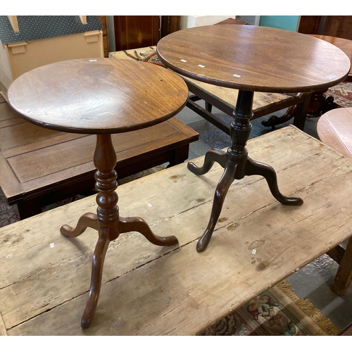 571 - Two mahogany snap top tripod tables.  Diameter 65 and 46cm approx.  (2)  (B.P. 21% + VAT)