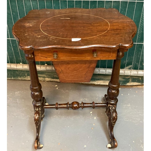 579 - Victorian mahogany work table, the shaped top above a single pullout deep drawer standing on baluste... 