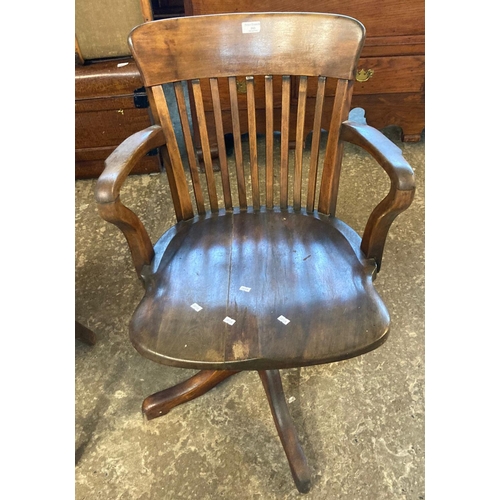 593 - Mid 20th century beech stick backed office capstan elbow chair.    (B.P. 21% + VAT)