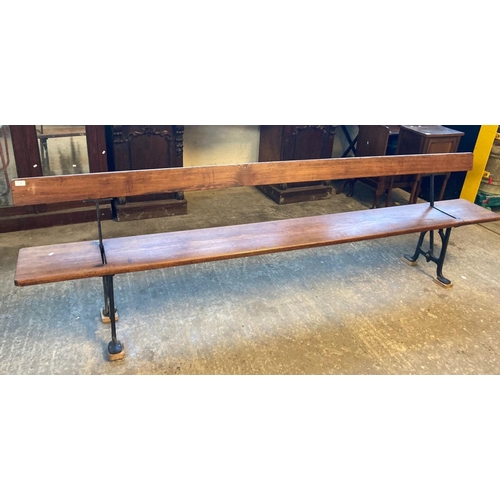 597 - Early 20th century cast iron pitch pine school/platform bench with reversible back rest.   (B.P. 21%... 