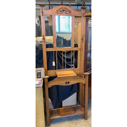 614 - Early 20th century oak mirror backed hall stand with glove box.   (B.P. 21% + VAT)