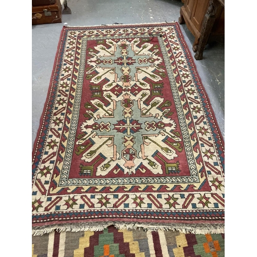 627 - Probably Turkish red ground geometric rug.  208x130cm approx.   (B.P. 21% + VAT)