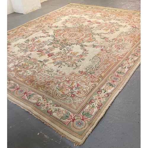 629 - Large Indian cream ground foliate decorated carpet.  385x197cm approx.   (B.P. 21% + VAT)