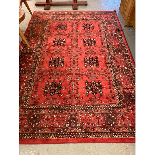 632 - Kashmir Afghan design red ground foliate and geometric carpet.  160x232cm approx.   (B.P. 21% + VAT)