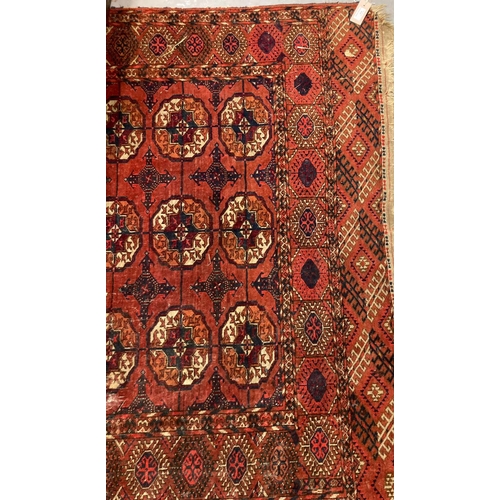 634 - Tekke Bokahra red ground rug.  200x140cm approx.   (B.P. 21% + VAT)