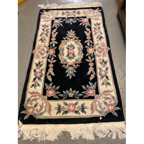 638 - Chinese wash ground foliate and floral rug.  160x94cm approx.   (B.P. 21% + VAT)