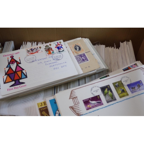 76 - Jersey collection of First Day covers in large box.  Commemoratives and definitives, mostly three of... 