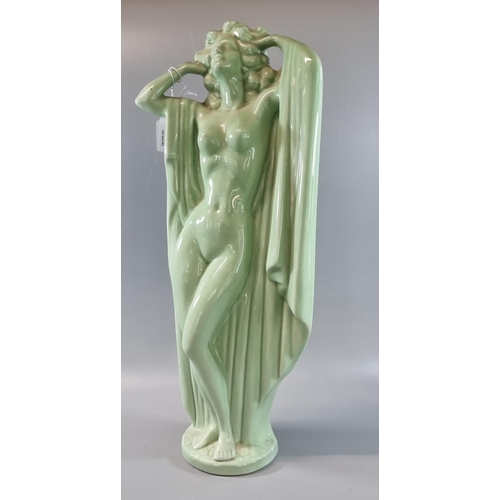 85 - Art Nouveau style celadon glazed figure of a nude lady on naturalistic circular base, unmarked.  52c... 