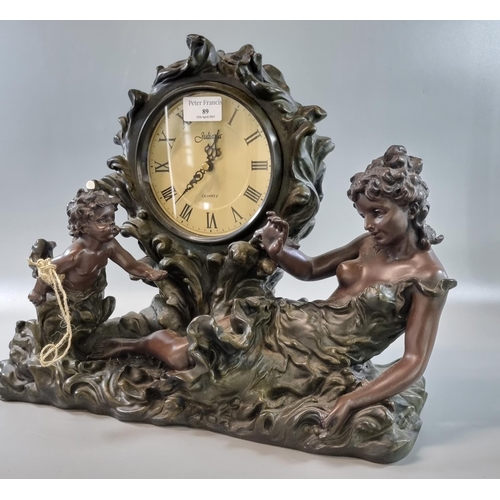 89 - Juliana quartz bronzed mantle clock in Art Nouveau style with figure of semi-nude lady and cherub.  ... 