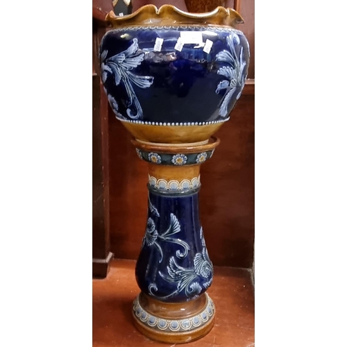 92 - Late 19th early 20th century Doulton Lambeth jardinière on stand on a cobalt blue ground with moulde... 