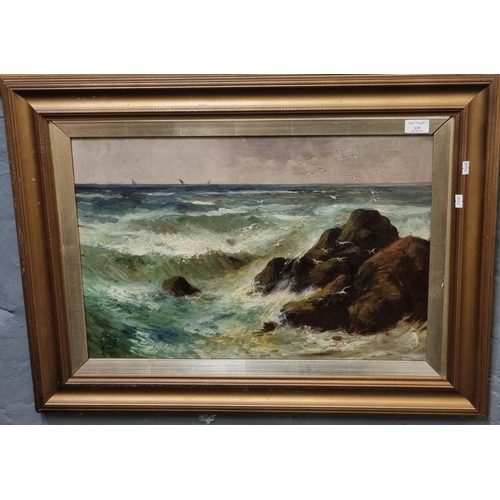 119 - Joel Owen, rocky coastal study with crashing surf and distant sailing vessels, signed dated 1928.  O... 