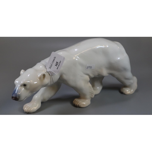 165 - Royal Copenhagen Danish porcelain figure of a striding polar bear, shape no. 425.
(B.P. 21% + VAT)