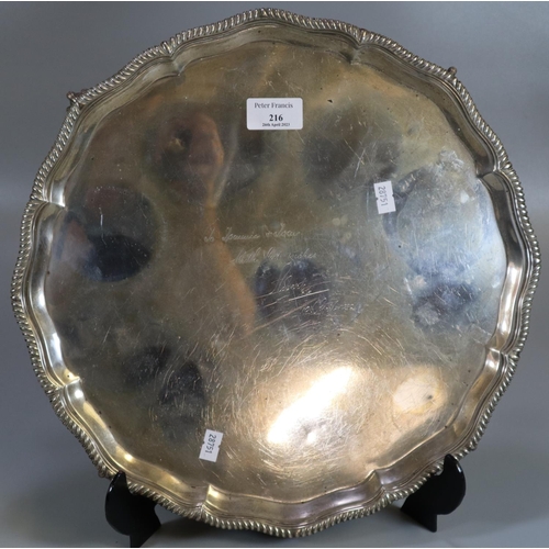 216 - Early 20th century silver presentation pie crust salver standing on ball and claw feet, inscribed Wi...