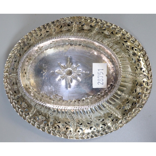 221 - Silver pierced basket/bonbon dish with spiral design swing handle, indistinct but probably London ha... 