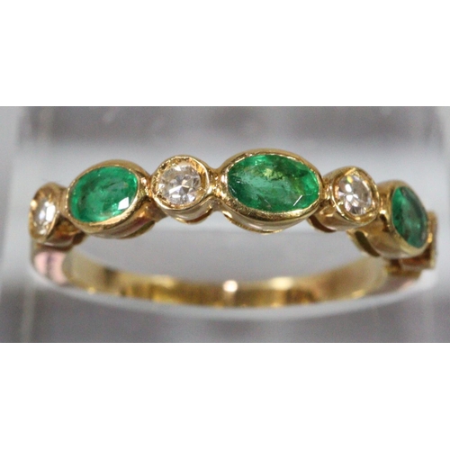 235 - 18ct diamond and emerald ring, 2.8g approx.  Ring size L+1/2.  (B.P. 21% + VAT)