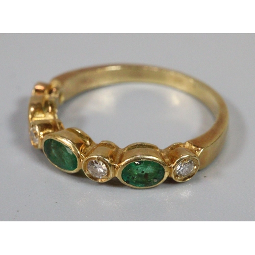 235 - 18ct diamond and emerald ring, 2.8g approx.  Ring size L+1/2.  (B.P. 21% + VAT)