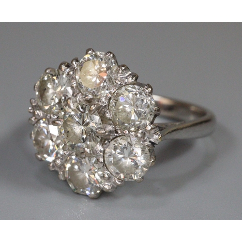 238 - Large diamond cluster ring set in 18ct white gold.  The brilliant cut diamonds an estimated total di... 