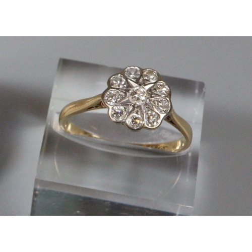 240 - 18ct gold diamond daisy/flower head ring, 2.8g approx.  Ring size P.  (B.P. 21% + VAT)