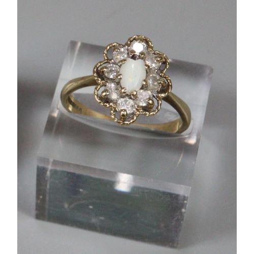 241 - 9ct gold opal flower head ring, 3.1 g approx.  Ring size P. (B.P. 21% + VAT)