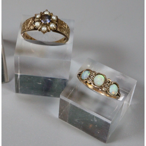 244 - 9ct gold flowerhead ring set with pearls and blue stone and an unmarked yellow metal ring set with o... 