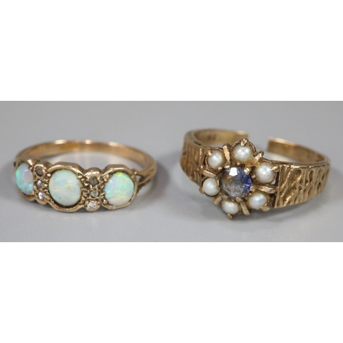 244 - 9ct gold flowerhead ring set with pearls and blue stone and an unmarked yellow metal ring set with o... 