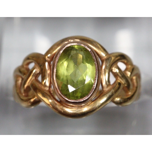 245 - 9ct gold Peridot ring, 2.4g approx.  Ring size J.  (B.P. 21% + VAT)