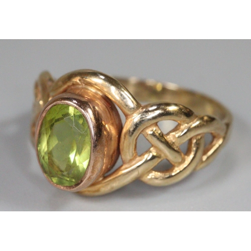 245 - 9ct gold Peridot ring, 2.4g approx.  Ring size J.  (B.P. 21% + VAT)