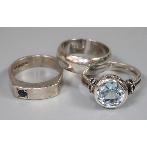 247 - Three assorted silver rings, one set with blue stone. (3)  (B.P. 21% + VAT)