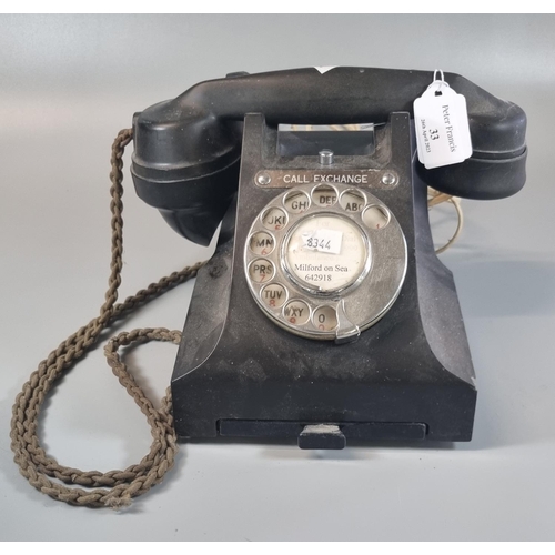 33 - Vintage bakelite telephone, the dial marked 'Milford on Sea'.
(B.P. 21% + VAT)