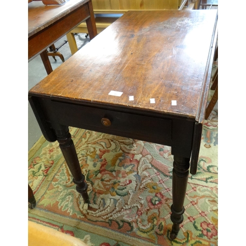 495 - Victorian mahogany Pembroke table on ring turned baluster legs and casters.  (B.P. 21% + VAT)