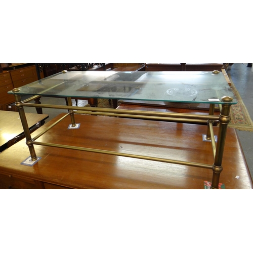 504 - Brass framed glass top coffee table.  113x56x45cm approx.  (B.P. 21% + VAT)