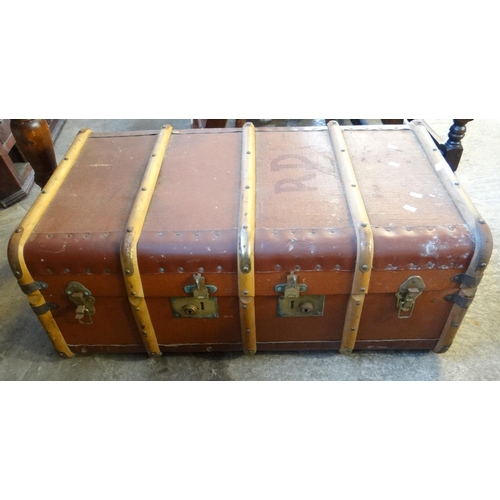 536 - Vintage canvas wooden and metal banded travelling trunk with carrying handles.  (B.P. 21% + VAT)