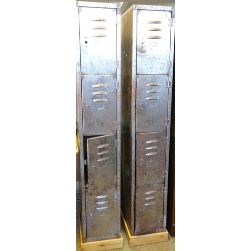 547 - Pair of vintage industrial metal four door gym lockers on wooden pine stands.  (2)  (B.P. 21% + VAT)