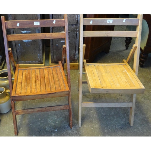 548 - Two similar beech folding chairs.  (2)  (B.P. 21% + VAT)