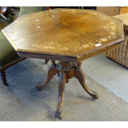 553 - Victorian walnut florally inlaid octagonal centre table on quatrefoil base.  (B.P. 21% + VAT)