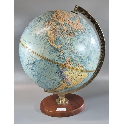 80 - Phillip's stereo-relief table globe on wooden circular stand.
(B.P. 21% + VAT)