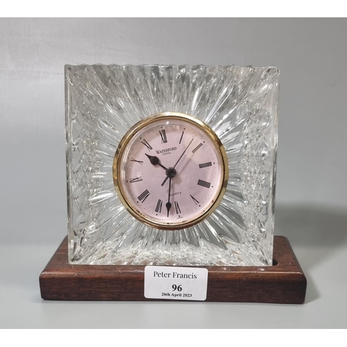 96 - Waterford crystal quartz mantel clock on wooden stand. 
(B.P. 21% + VAT)