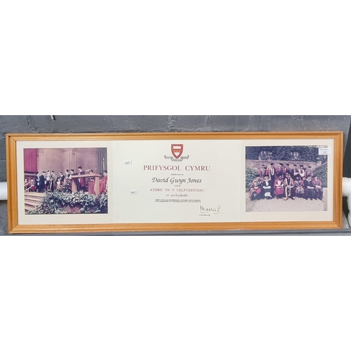 130 - University of Wales certificate with photographs signed by Charles Prince of Wales.  25x97cm approx.... 