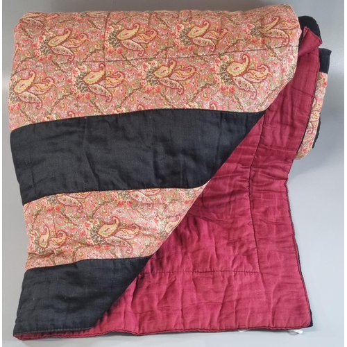 152 - Small vintage cotton patchwork quilt with paisley and black rectangular stripes to one side and plai... 