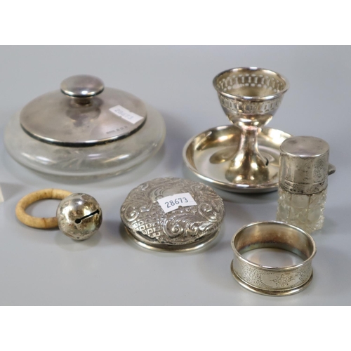 217 - Collection of silver and similar items to include: silver topped and glass scent bottle, silver topp... 