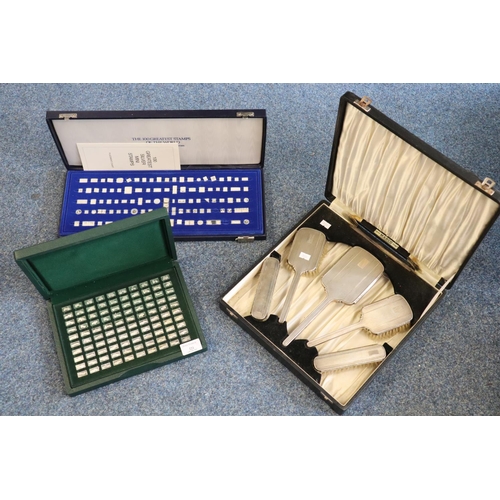 221 - Art Deco engine turned cased ladies vanity set of four hand brushes and one hand mirror, the box mar... 