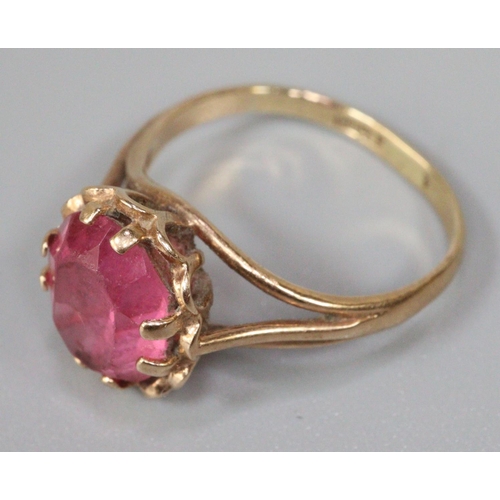 224 - Yellow metal pink stone ring, size I 1/2, 2.2g approx.  (B.P. 21% + VAT)