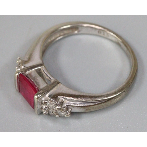 229 - 9ct white gold ruby and diamond ring.  Size I 1/2, 3.1g approx.  (B.P. 21% + VAT)